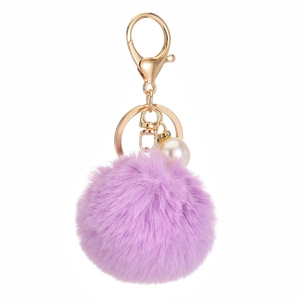 Plush faux rabbit fur keychain in light purple with gold clasp and pearl charm
