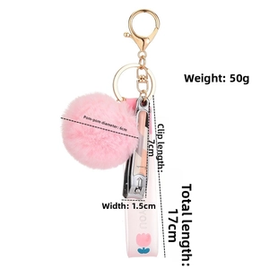 Detailed size chart of pink pompom keychain set with nail clipper and floral lanyard