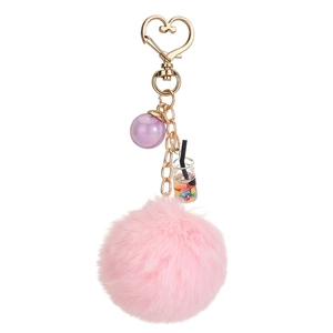 Pink faux rabbit fur pom pom keychain with mini bubble tea charm and heart clasp