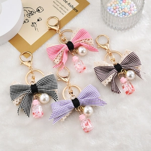 Bowknot pearl keychain set with lace ribbon and gold hook for car keys and bags