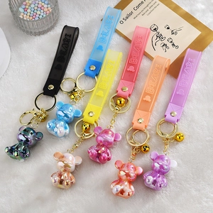 Colorful gradient bear keychains in six vibrant shades with silicone wrist straps