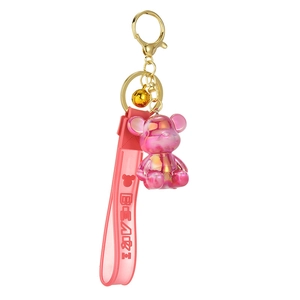Pink gradient resin bear keychain with flexible PVC wristband and gold bell accessory