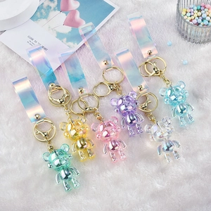 Set of six colorful acrylic bear keychains with laser texture and golden metal rings