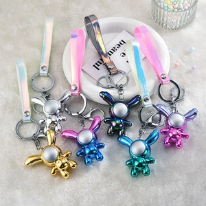Set of 6 colorful iridescent mirror bunny keychains with acrylic charms for backpacks