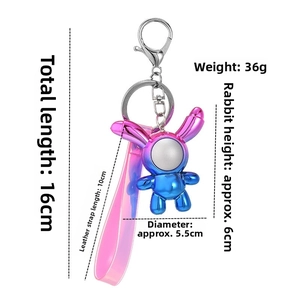 Detailed dimensions of holographic astronaut rabbit keychain with dimensions and silver clasp