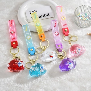 Colorful cloud liquid quicksand keychains with cartoon rabbit straps in five vibrant colors