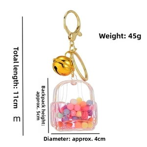Dimensions détaillées du porte-clés sac à dos en acrylique avec billes et clochette dorée