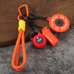 Porte-clés de fitness avec disque d'haltère orange, kettlebell rouge et gourde
