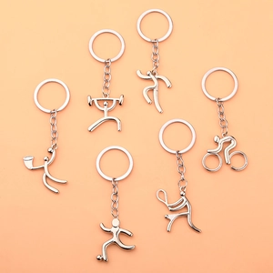 Set of 6 silver metal sports keychains featuring football, cycling, and weightlifting motifs
