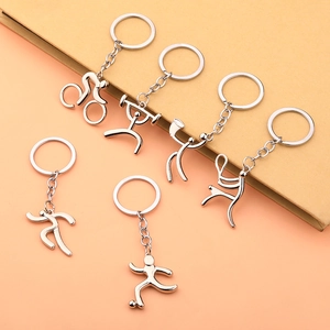 Polished silver alloy sports keychains featuring cycling, lifting, and soccer motifs