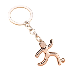 Rose gold soccer player keychain with artistic abstract design and polished metal finish