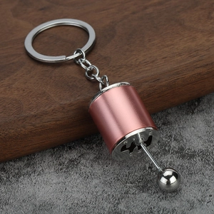 Creative manual 6-speed gear shift keychain in rose gold and silver metal finish