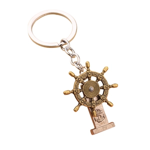 Vintage bronze nautical ship wheel keychain with anchor pendant on silver ring chain
