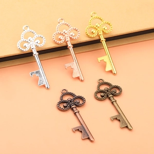 Detailed set of vintage metal key pendants in silver, gold, and bronze finishes