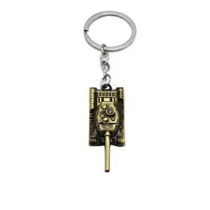 Macro detail of a vintage bronze tank model keychain with intricate metallic textures