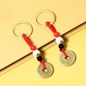 Porte-clés traditionnels chinois en lotus Bodhi avec nœuds rouges et pièces anciennes