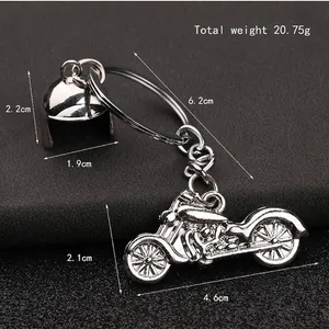 Metal Harley-style motorcycle and helmet keychain set with detailed size measurements