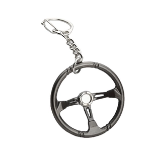 Grey racing steering wheel keychain with silver horseshoe D-ring and metal chain link