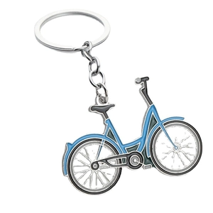 Blue and black metal bicycle keychain with silver accents on a clean white background