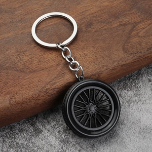 Creative PVC soft rubber tire keychain with realistic tread and metal ring for car keys