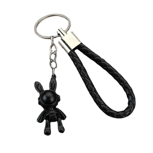 Creative black space rabbit keychain with braided leather strap and metal ring