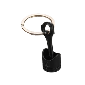 Creative black engine piston keychain for car enthusiasts made of durable metal alloy