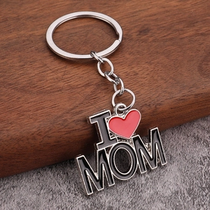 Detail of I Love Mom metal keychain with red heart enamel and silver ring attachment
