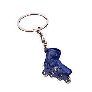 3D roller skate keychain with miniature wheels and silver metal ring in blue and white color