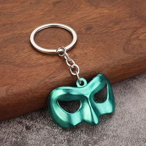 Green Lantern style superhero mask keychain with glossy emerald finish on a metal ring