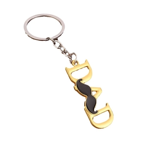 Gouden DAD-sleutelhanger met zwarte snor hanger als vaderdagcadeau
