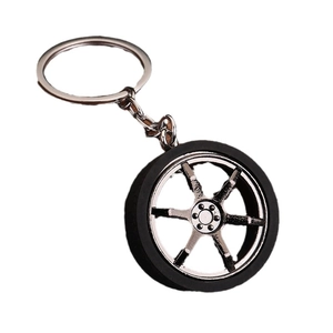Metal car wheel rim keychain with black rubber tire and six-spoke design for car keys
