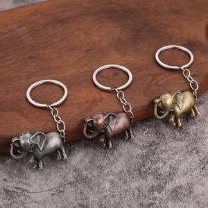 Vintage elephant metal keychains in silver, bronze, and gold finish for bags and keys