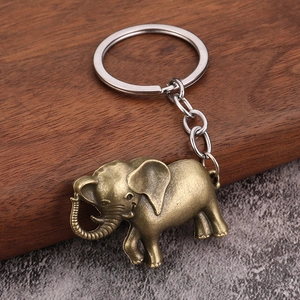 Vintage elephant metal keychain with antique bronze finish and round ring for bags