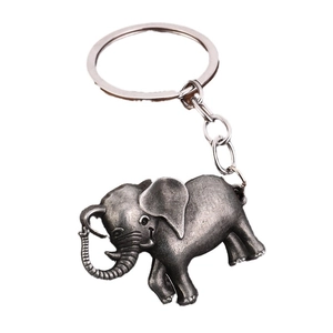 Vintage elephant keychain in antique silver finish with detailed metallic texture