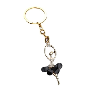 Ballerina keychain with gold metal frame, sparkling rhinestones, and black pleated skirt