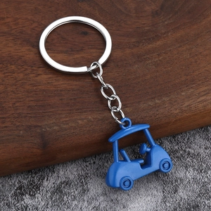 3D miniature golf cart keychain in vibrant blue finish with metal link and ring