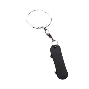 Creative black leather and silver metal keychain featuring a minimalist oval strap design