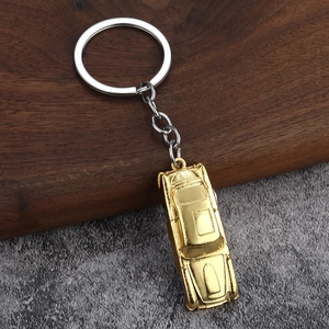 Llavero creativo de aleación de zinc dorado, coche descapotable con anillo de plata