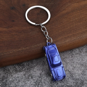 Llavero creativo de aleación de zinc con forma de coche azul y acabado metálico