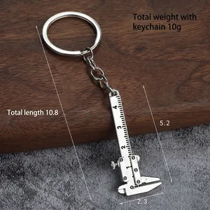 Mini silver vernier caliper keychain in zinc alloy with detailed metric scale markings