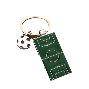 Zinc alloy soccer keychain featuring football and green pitch charms for sports fans