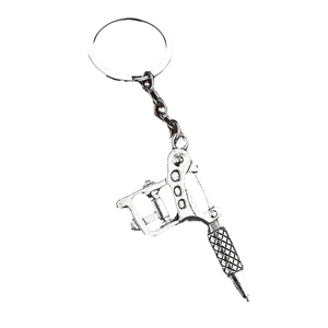 Creative antique silver tattoo machine keychain pendant with realistic metal details