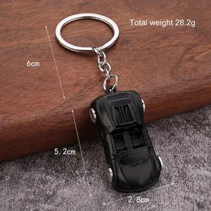 Matte black convertible sports car metal keychain with 28.2g weight and size details