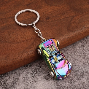 Polished rainbow finish metal car keychain in a sporty convertible race car design