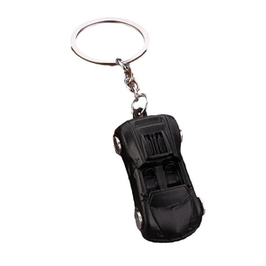 Sleek black convertible sports car metal keychain with matte finish and silver wheels