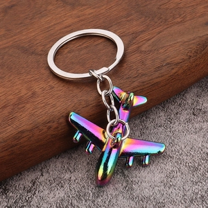 Realistic colorful metal airplane keychain with vibrant electroplated rainbow finish