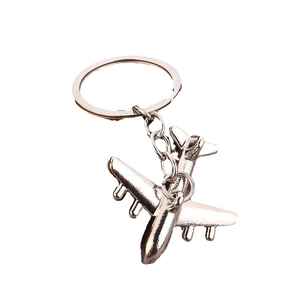 Polished silver zinc alloy airplane model keychain with high-detail metallic finish