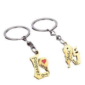 Couples heart puzzle keychain set with Forever Love engraving in gold and silver finish