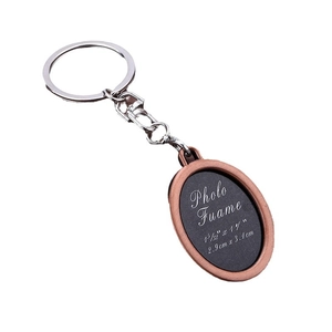 Vintage bronze oval photo frame keychain with silver ring for personalized memories