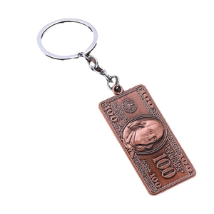 Retro copper alloy dollar bill keychain featuring detailed Franklin portrait and 100 dollar icon